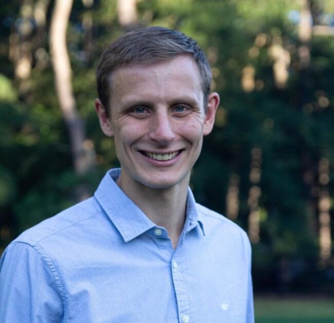 Karl-Johnson-e1699462427380-738×714 Headshot of Karl Johnson